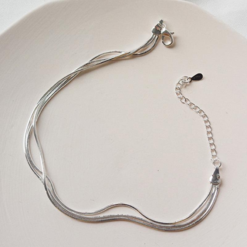 Extra Fine Women's Titanium Steel Snake Bone Chain Bracelet/Anklet - Non-Fading, Simple, Light Luxury, Versatile, and Stackable.