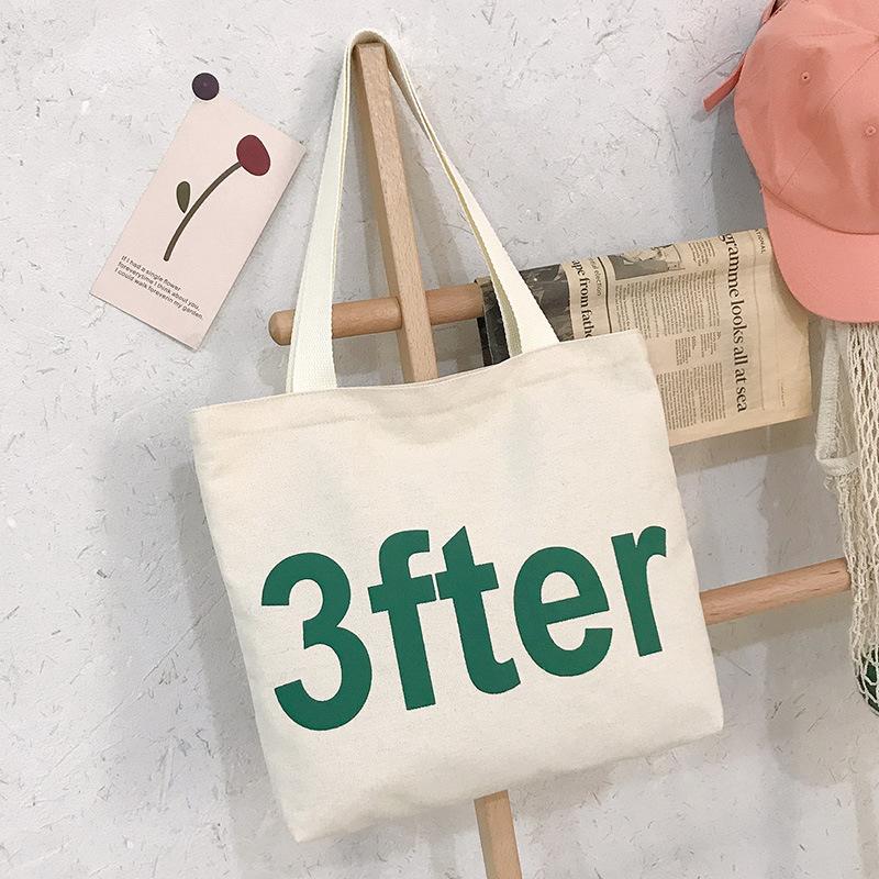 

Letter literary shoulder bag, student make-up bag, large-capacity canvas bag, women s shopping bag, wind handbag.