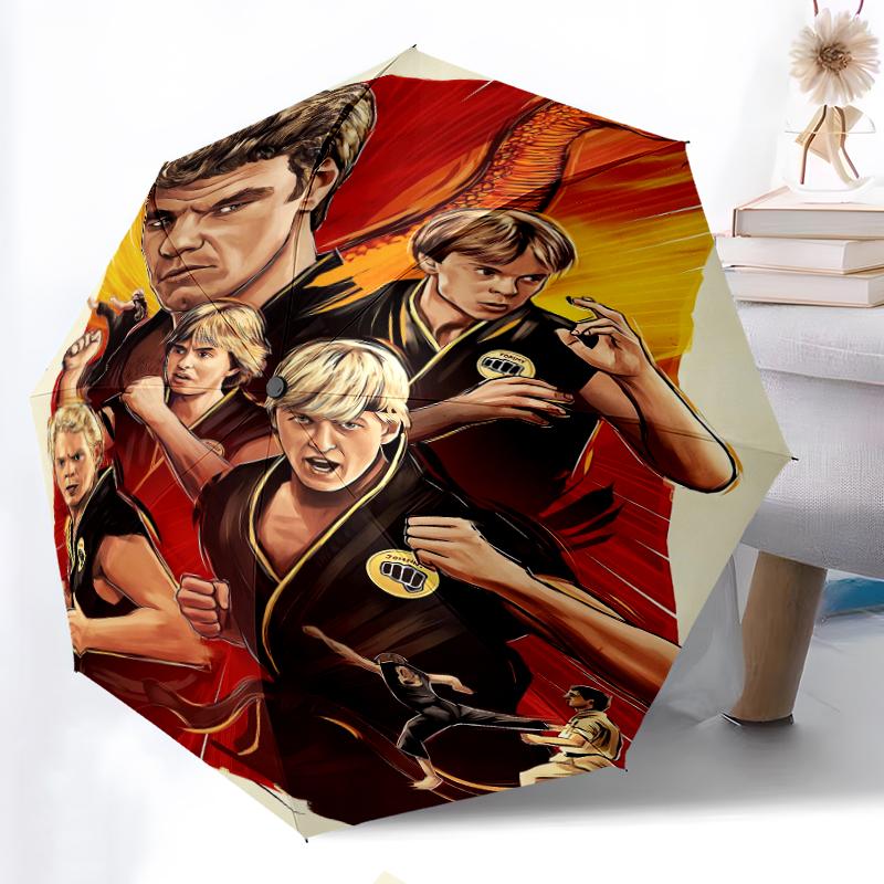 Cobra Kai Fashionable Automatic Opening/Closing Folding Umbrella. Portable and Foldable, Ideal for Gift, Travel, and Daily Use.