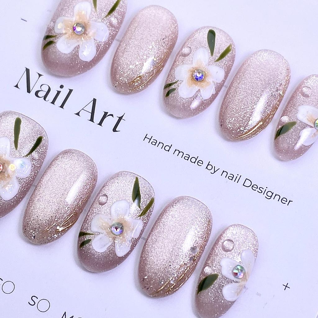 Hot-Selling Hand-Painted Floral Cat Eye Nail Tips - Ice Transparent Nude, Gentle Style Wearable Nails.