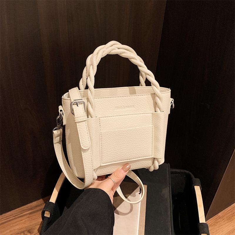 Stylish and simple interwoven rope hand withdrawal bucket bag simple casual texture bag daily versatile shoulder messenger bag