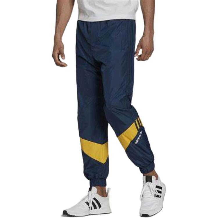 adidas Pantaloni da jogging Originals con strisce a trifoglio e polsini a contrasto da uomo fondo blu navy HF9227