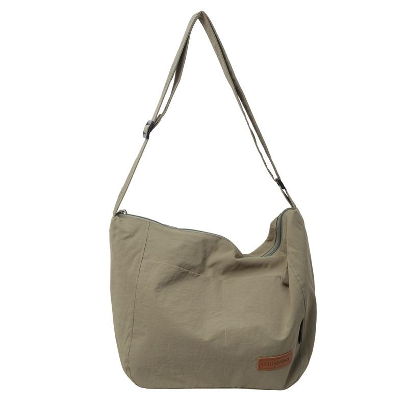 New simple and fashionable large-capacity Japanese solid color shoulder bag versatile casual trend lazy wind messenger bag