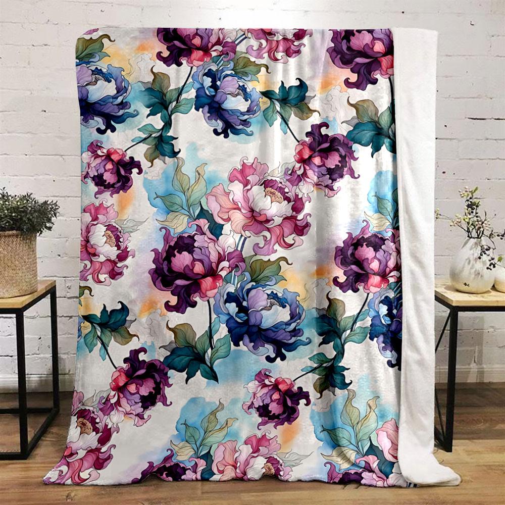 Vibrant floral motifs with flowing petals and greenery on light background. for all seasons blanket lunch break throw gift