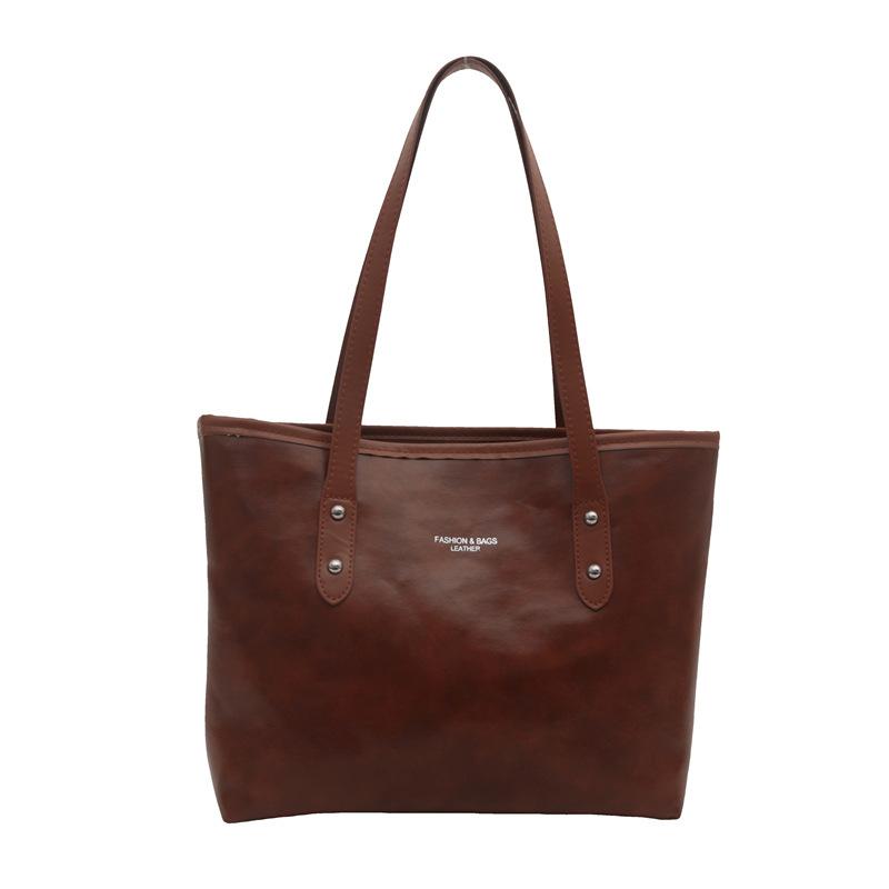 

Корейська версія великої сумки для жінок літо 2024 нова повсякденна сумочка для поїздок на роботу і роботу сумочка під пахвами через плече коричневий