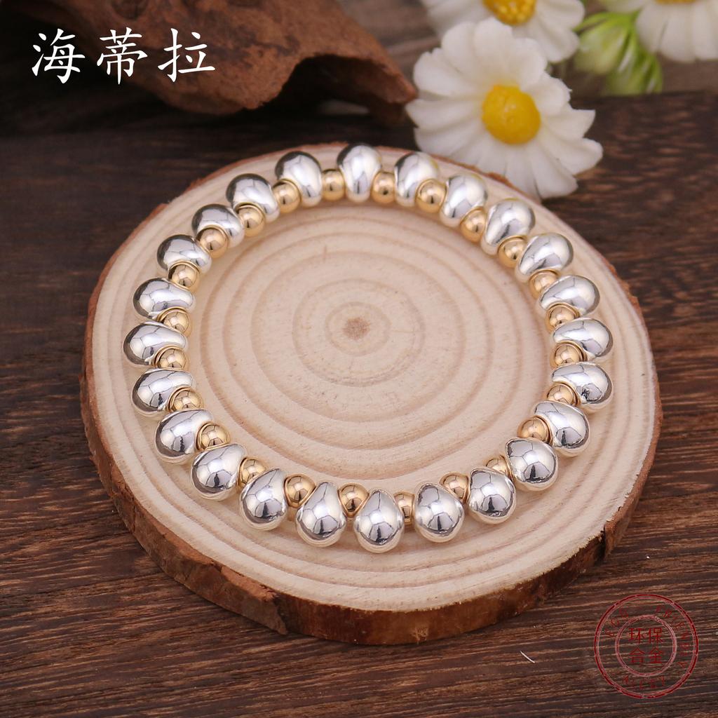 Water drop-shaped beaded environmentally friendly alloy bracelet, electroplated gold, gun black combination elastic rope bracelet female