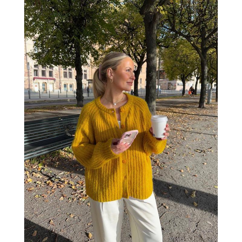 Autumn and winter street fashion solid color knitted cardigan, temperament all-match casual round neck long-sleeved sweater jacket