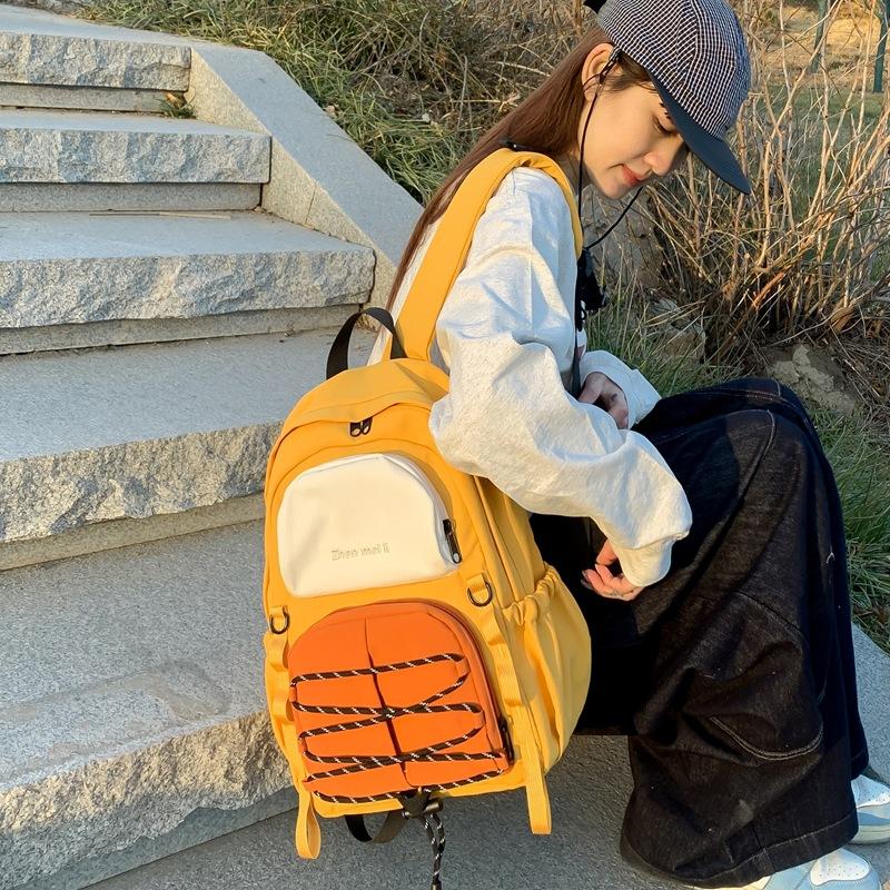 Schoolbag contrasting color outdoor sports mountaineering bag female 1011 new male college student commuting backpack light travel backpack tide