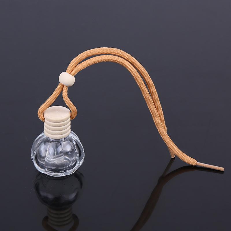 

Прозрачный флакон для автомобильного парфюма 15 мл с засушенным цветком, колпачком с пятью линиями и модным кулоном-шнурком 15ML