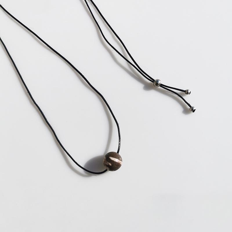 Unisex Retro Geometric Stone Pendant Necklace with Rotating Bead & Leather Cord – Versatile, High-End, Colorfast Design for Women & Men