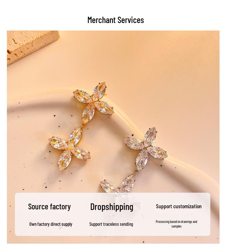 Light Luxury Double Cross Four-Leaf Clover Zircon Earrings in Gold-Plated Copper.