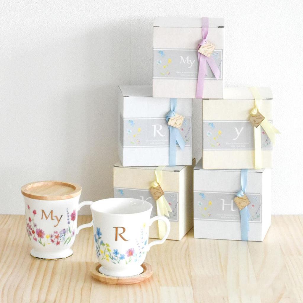 This Elegant 350ml Mug Features a Delicate Floral Design and a Gold Initial It Comes with a Coaster That Doubles As a Lid or Small It Also Comes In a