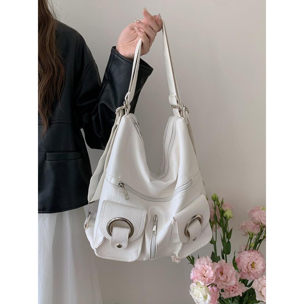 Koreanische Version Schlichte Persönlichkeit Vielseitig Modisch Reißverschlusstasche PU-Leder Tragetasche Schultertasche Pendeln Große Kapazität Rucksack