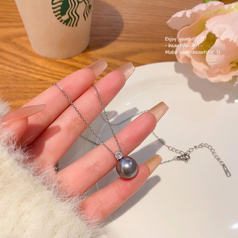 

Элегантное серое жемчужное ожерелье для женщин: Простая роскошь с цепочкой на ключицу из циркония – универсально, шикарно и в тренде X1325