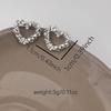 Silver Plated Hollow Heart Cubic Zirconia Stud Earrings