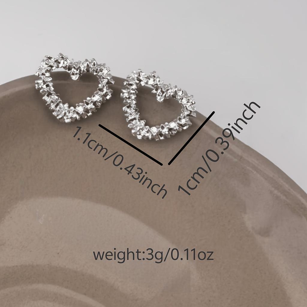 Silver Plated Hollow Heart Cubic Zirconia Stud Earrings