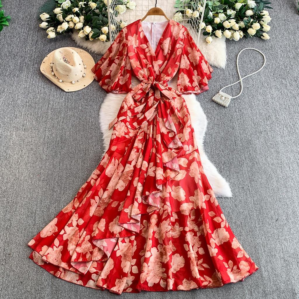 French holiday style beautiful fairy gas printing V-neck dress women's autumn and winter waist irregular elegant ruffle skirt