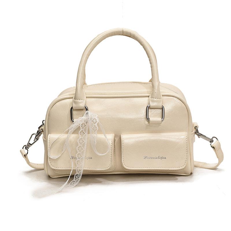 Fashion portable small square bag women's 2025 new hand-held class commuter leisure shoulder bag versatile oblique span women's bag