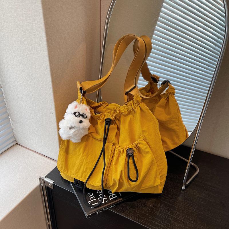 Cloth bag women's large-capacity new summer leisure niche drawstring single shoulder crossbody commuter tote bag