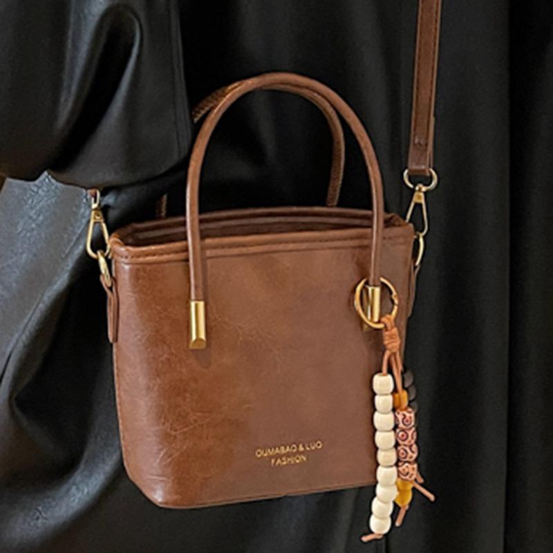 Casual retro small bag women's new fashion messenger bag commuter shoulder high value bucket bag