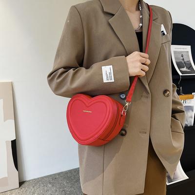Herzförmige Umhängetaschen für Damen, einfarbige PU-Leder-Schultertaschen, modische Handtaschen