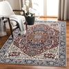 The living room sofa is extensively covered with carpet