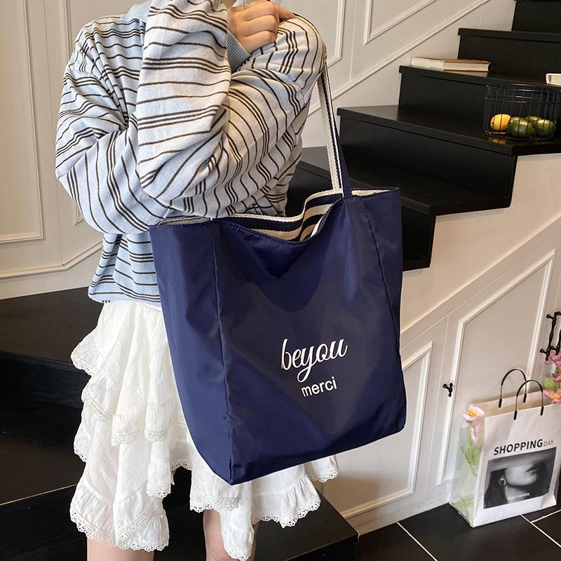 Lazy wind striped canvas bag women's 2025 new commuter double-sided tote bag red fashion casual shoulder bag