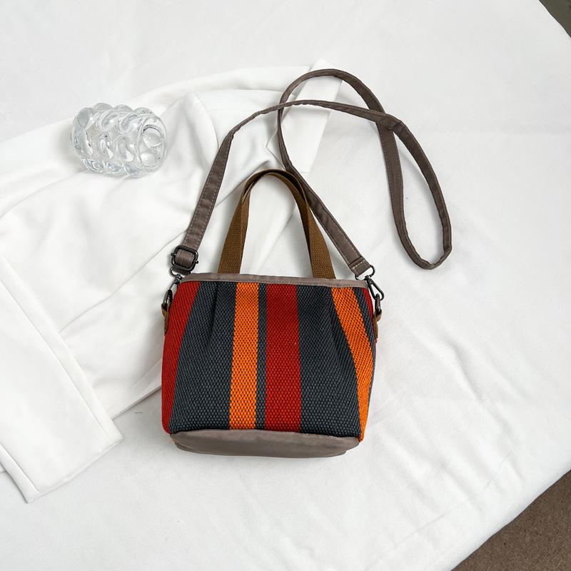 Canvas-Tasche mit großem Fassungsvermögen, gestreift, Damen, Sommer 2025, neue trendige Mode, tragbare Tragetasche, Pendler-Umhängetasche