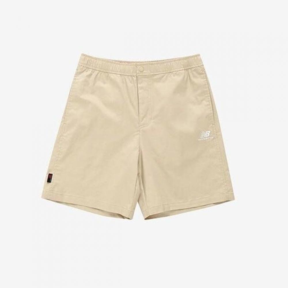 

New Balance Unisex Oxford 4.5 Short Pants Beige Nbnvd22 75(S)