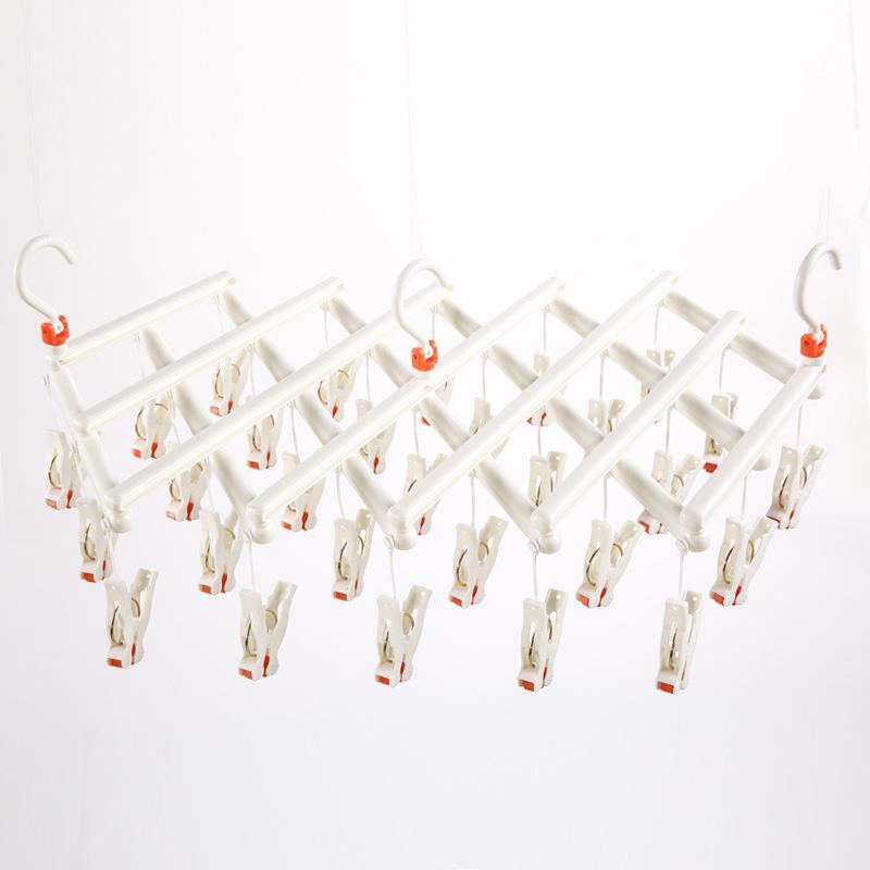 Multi-Functional Retractable Windproof Clothes Drying Rack with Seamless 3D Design and Storage Clips