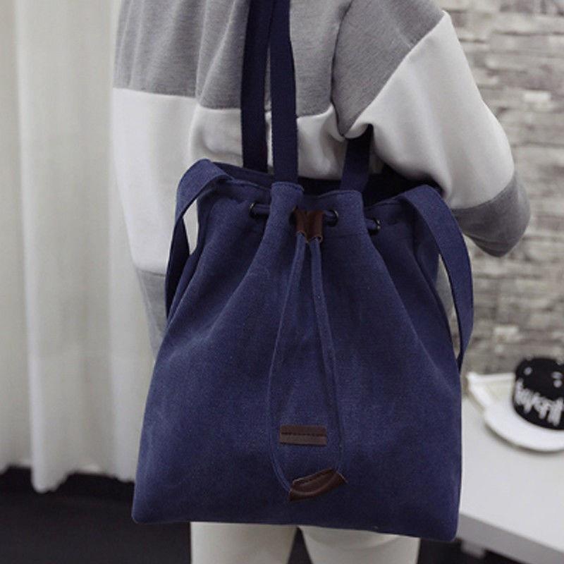 Elegant Women's Canvas Black Handbag With Adjustable Shoulder Strap And Soft Handle