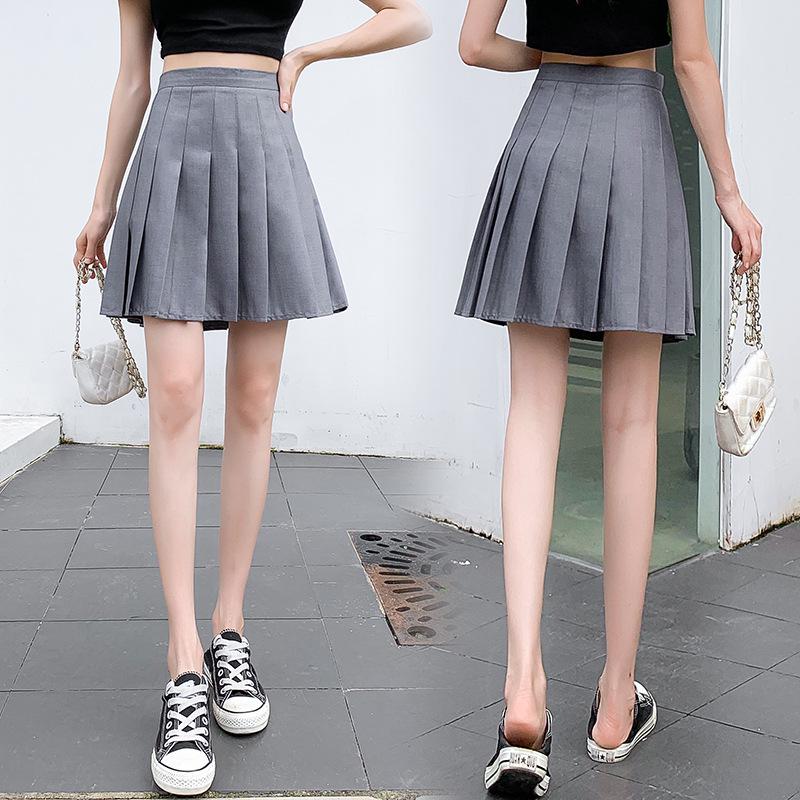 2024 Nová dámská sukně s vysokým pasem, jednobarevná, áčkového střihu, plisovaná, nadměrná velikost, střední délky, zeštíhlující, akademický styl