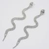 Boucles d'oreilles élégantes à pampilles en forme de serpent et strass: Un mélange exquis de mode européenne et américaine