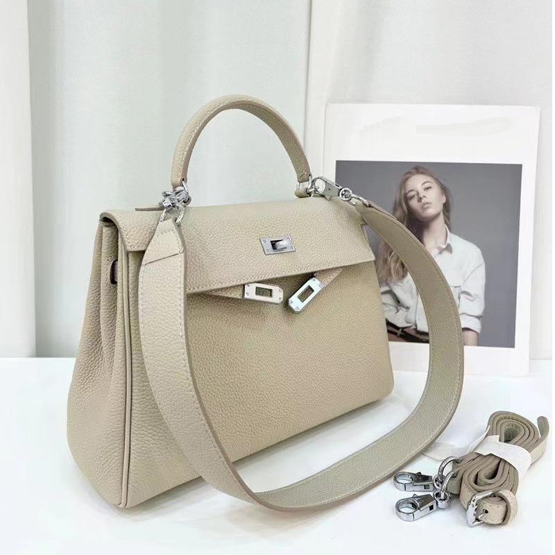 Silver Buckle Bag With Wide Shoulder Straps TOGO Head Layer Genuine Leather Silver Buckle Mesh Red Sea Anemone Purple Women's Bag