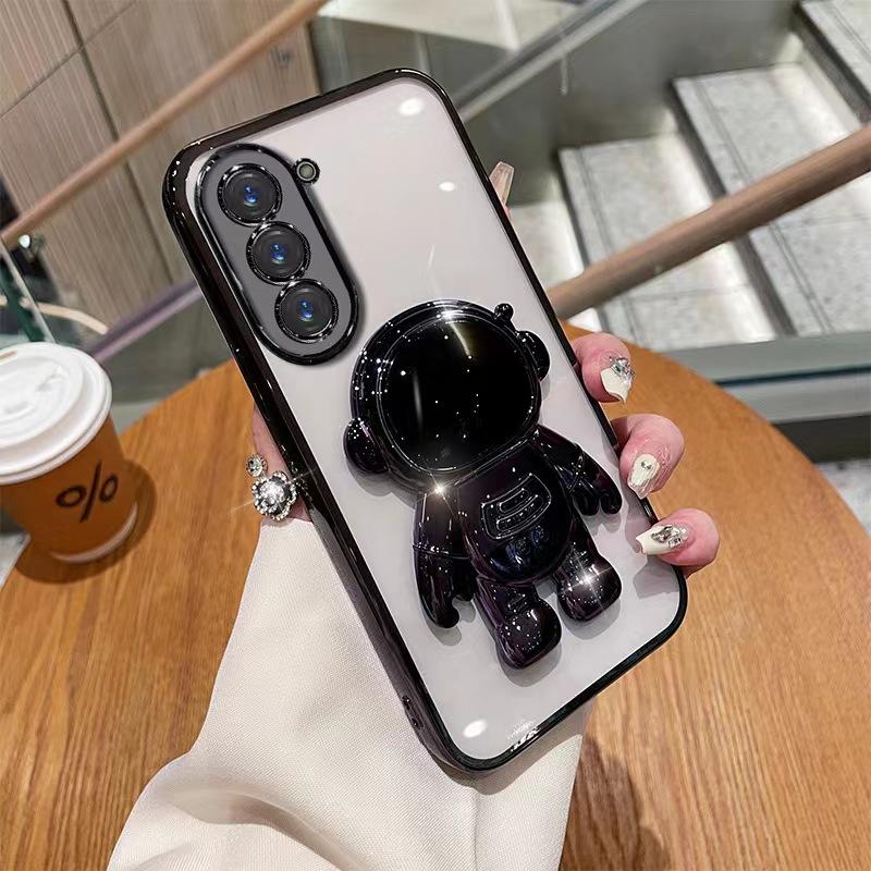 Astronaut Stand Suitable for Samsung S24ultra Mobile Phone Case S23Plus Gradient Flash Powder S22 Astronaut