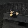 2025 New Arrival White Imitation Pearl Asymmetric Stud Earrings for Women Simple Metal Bow Heart-Shaped Earrings Date Jewelry