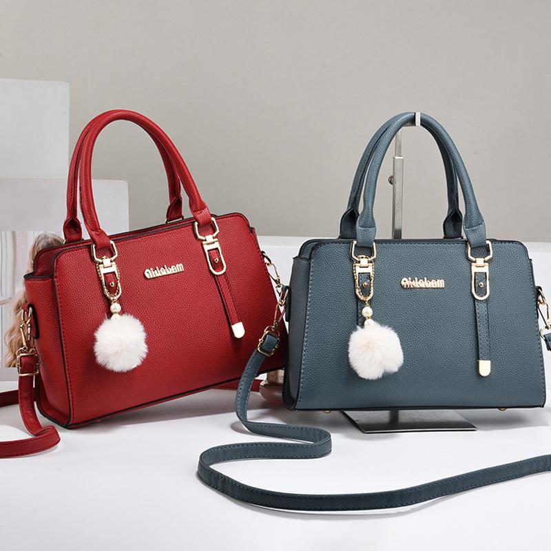 2 Stück Neue Handtasche mit großem Fassungsvermögen PU Wasserdichtes Mehrfach-Reißverschlussfach Schultertasche Temperament Pendler Vielseitig Pompon-Anhänger Umhängetasche