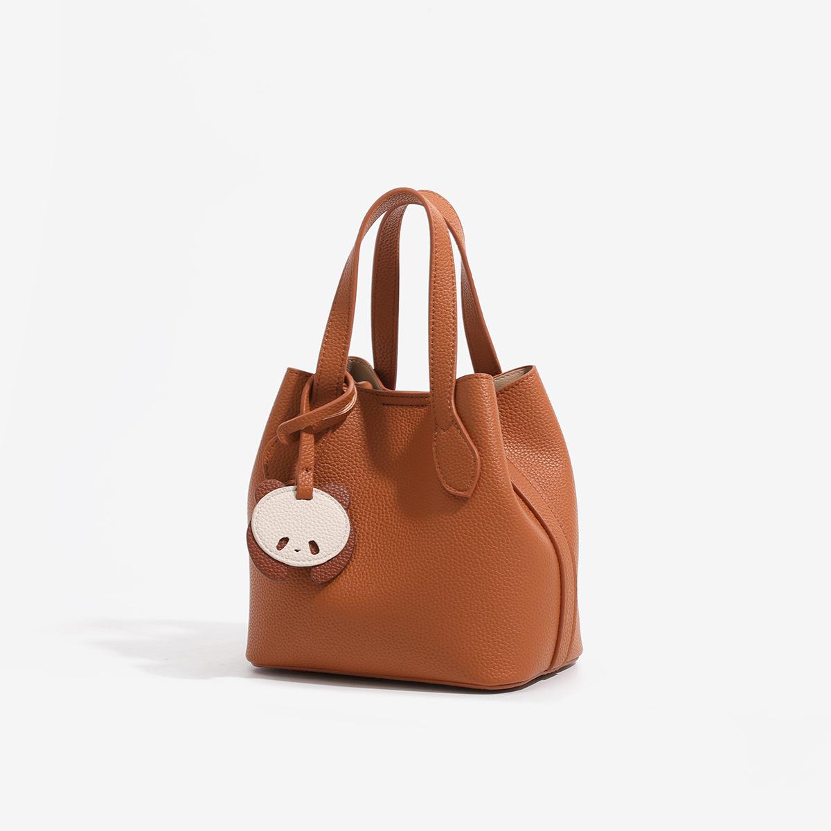 

Niche design large-capacity cartoon bucket bag 2025 spring and summer new commuter versatile portable messenger bag women