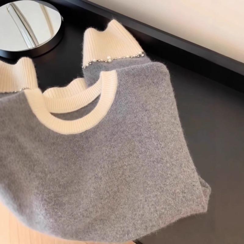 Fauler Wind lockerer Farbblock-Pullover Pullover Damen Herbst und Winter Design-Sinn Nische Bündelmanschetten Perlen