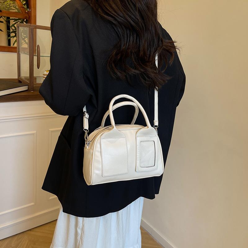 Korean version of retro portable Boston bag women's 2025 early spring new niche fashion foreign style versatile shoulder messenger bag