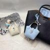 1Pcs Creative Bluetooth Earphone Bag Mini Cute Basket Bag Pendant High-Grade Leather Car Keychain Small Items Handbag