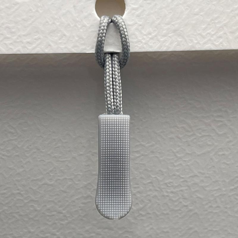 Available: Black Detachable Zipper Pull Lanyard with Silicone Rope.