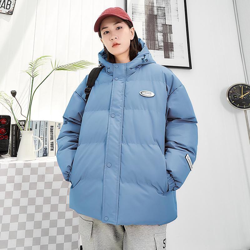 Beliebte Baumwollkleidung für Männer und Frauen, neuer Stil Kapuzen-Baumwollkleidung mit lockerem Schnitt, trendige koreanische kurze Winter-Baumwolljacke für Männer