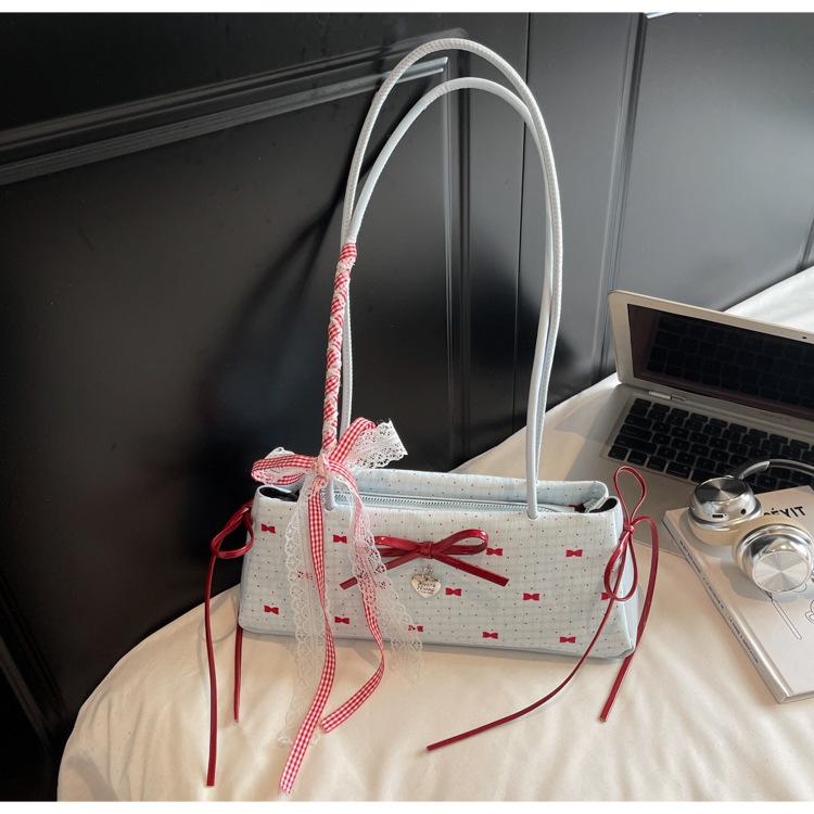 

Нишевый дизайн, чувство стиля, сумка-мессенджер под мышкой для поездок на работу, женская, новая 2025, стиль девочки, модная сумочка, сумка через плечо с бантом синий