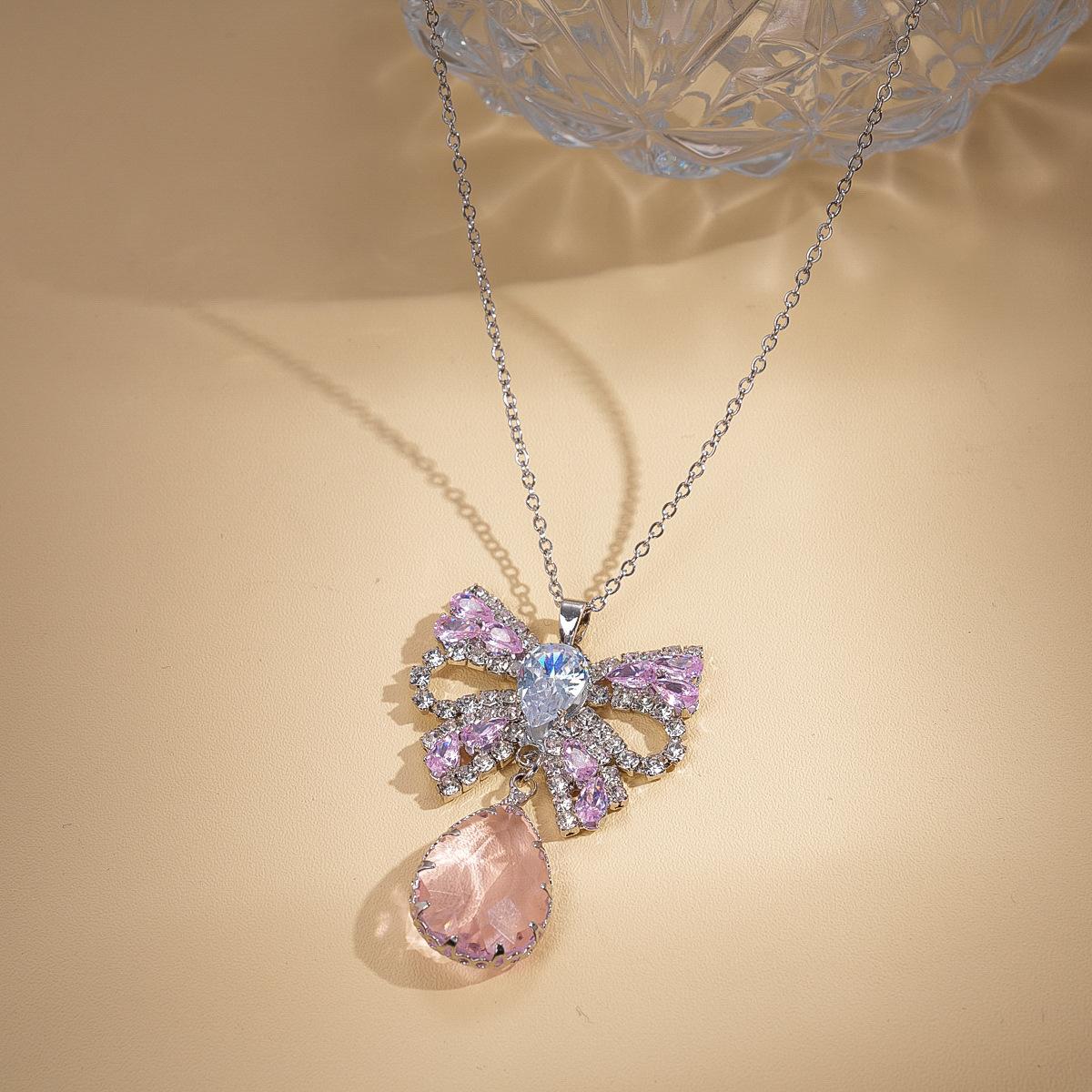 Wind zircon bow, water drop pendant, sweater chain, exquisite and sweet temperament necklace.