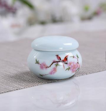 Blue ceramic jar with peach design and water droplets One Size