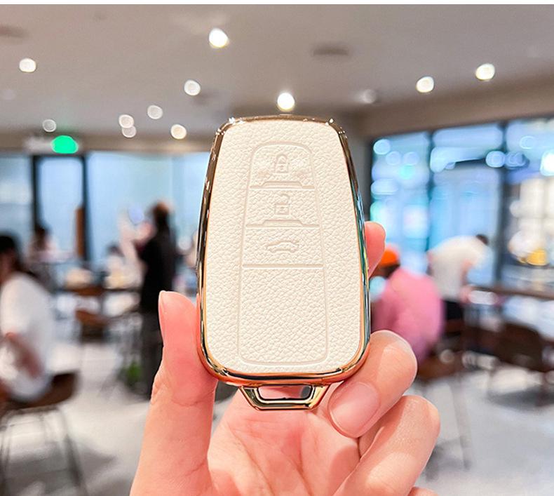 Toyota Key Cover for Camry, RAV4, Corolla, Levin, Avalon: Stylish Shell Buckle for Women.