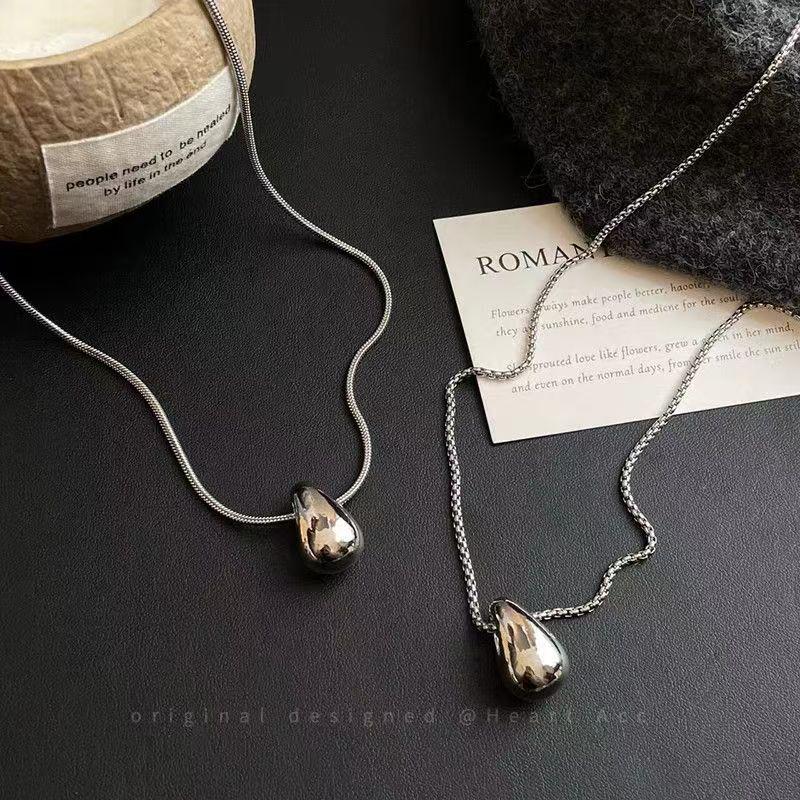 Minimalist Sterling Silver Water Drop Pendant Necklace - Versatile Long Layered Light Luxury Accessory for Women, Perfect for Autumn/Winter Sweaters.