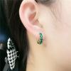 Retro Hong Kong style emerald earrings temperament design sense high-grade green ring ear buckle new light luxury zircon