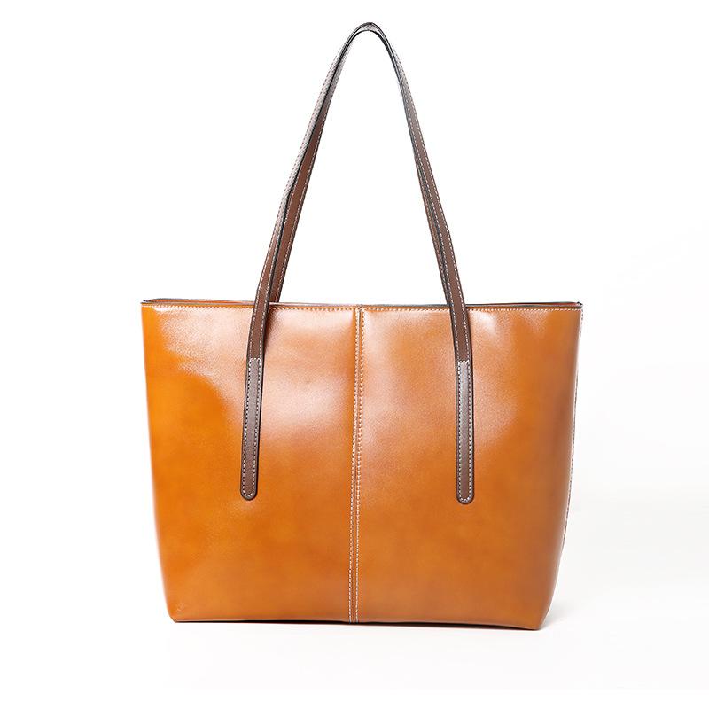 New leather women s bag portable large bag vegetable tanned first layer cowhide tote bag commuter shoulder bag women s large capacity